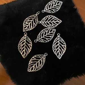 7 Silver coloured Leaf Charms